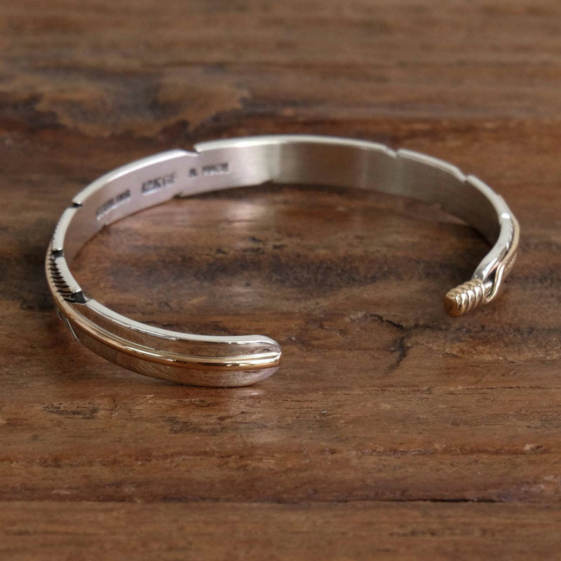 Feather bracelet by Harvey Mace (0.25")