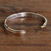 Feather bracelet by Harvey Mace (0.25")