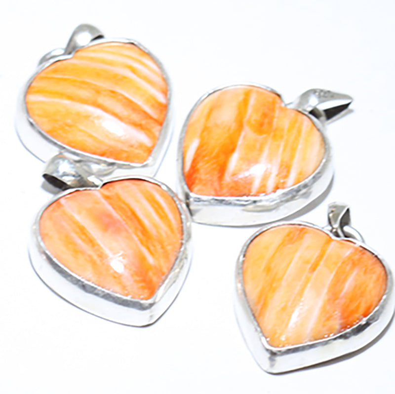 Orange Spiny Heart Pendant by Reva Goodluck