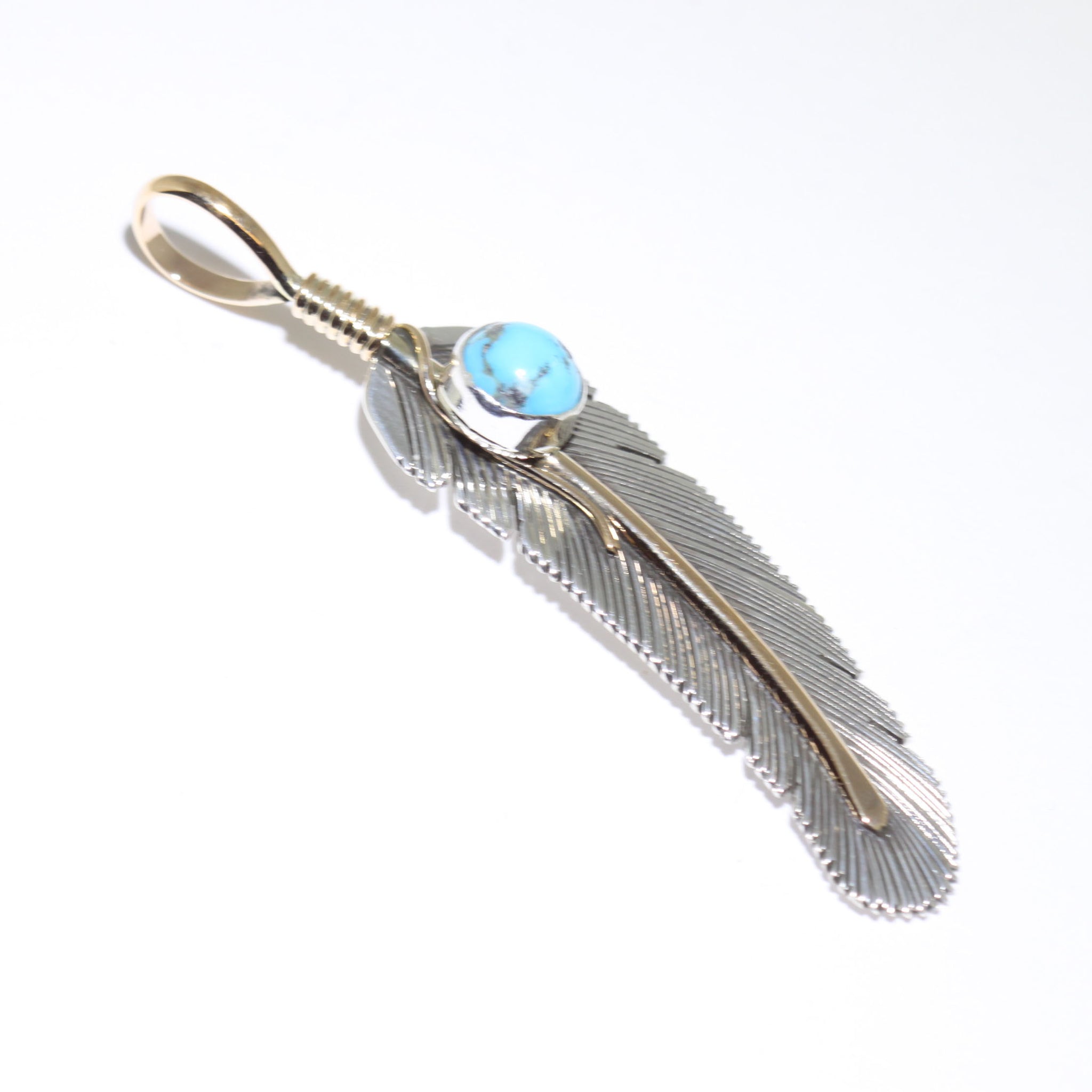 Feather pendant by Harvey Mace (silver or gold)