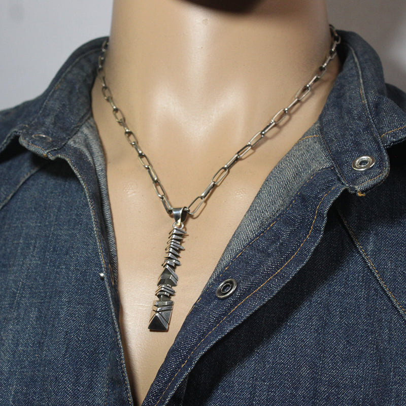 Cutting Pendant by Isaiah Ortiz