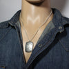 Silver Pendant by Norbert Peshlakai