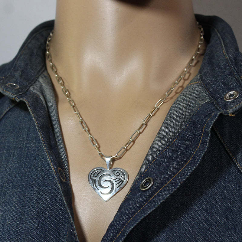 Silver Pendant by Ruben Saufkie