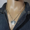 Silver Pendant by Ruben Saufkie