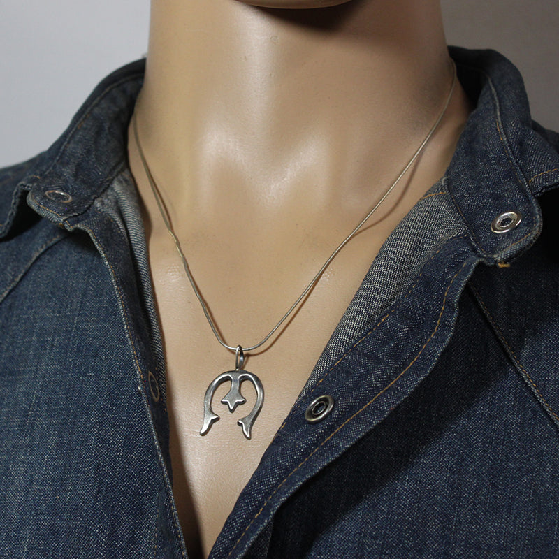 Naja Pendant by Pauline Nelson
