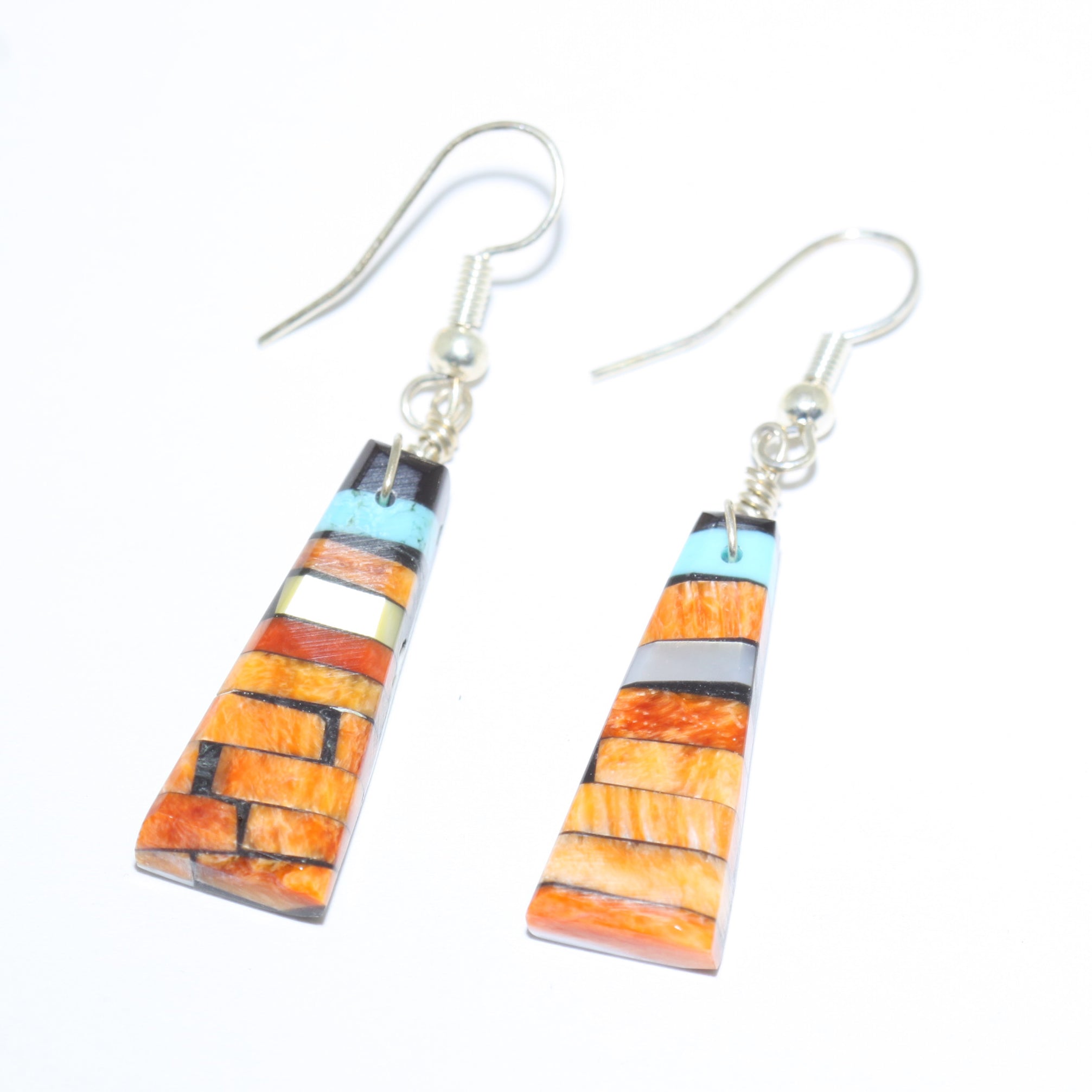 Earrings by Joe & Angie Reano