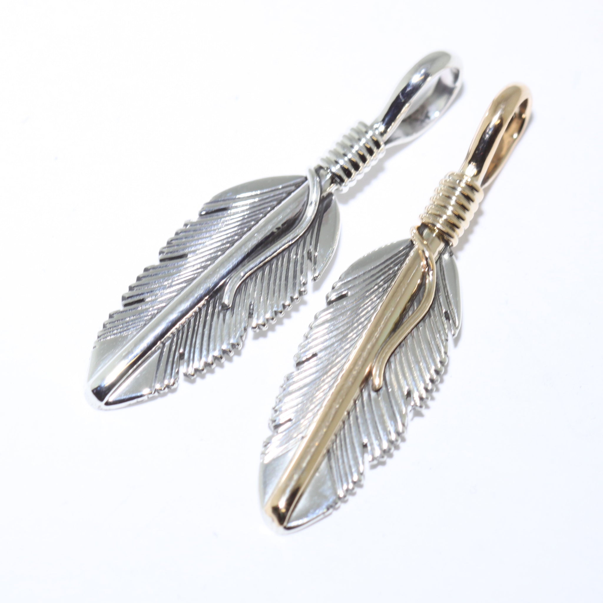 Feather pendant by Harvey Mace (silver or gold)