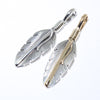 Feather pendant by Harvey Mace (silver or gold)