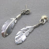 Feather earrings by Harvey Mace