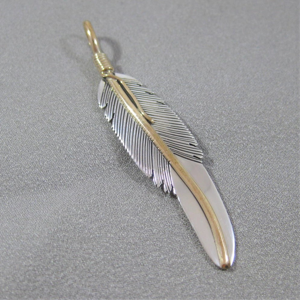 Feather pendant by Harvey Mace (silver or gold)