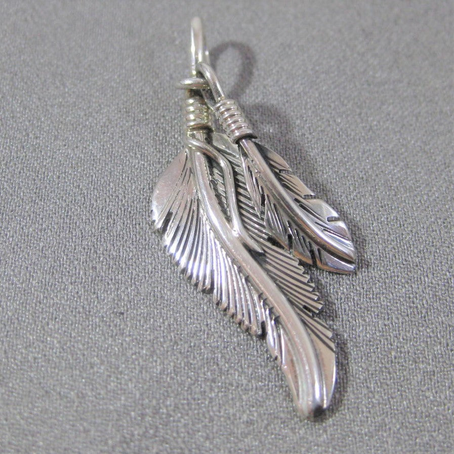 Feather pendant by Harvey Mace (silver or gold)