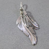 Feather pendant by Harvey Mace (silver or gold)