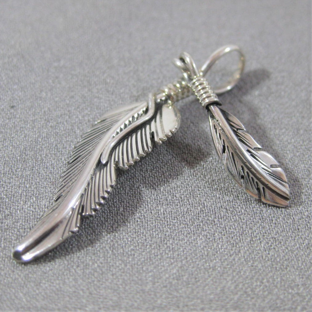 Feather pendant by Harvey Mace (silver or gold)