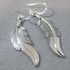 Feather earrings by Harvey Mace