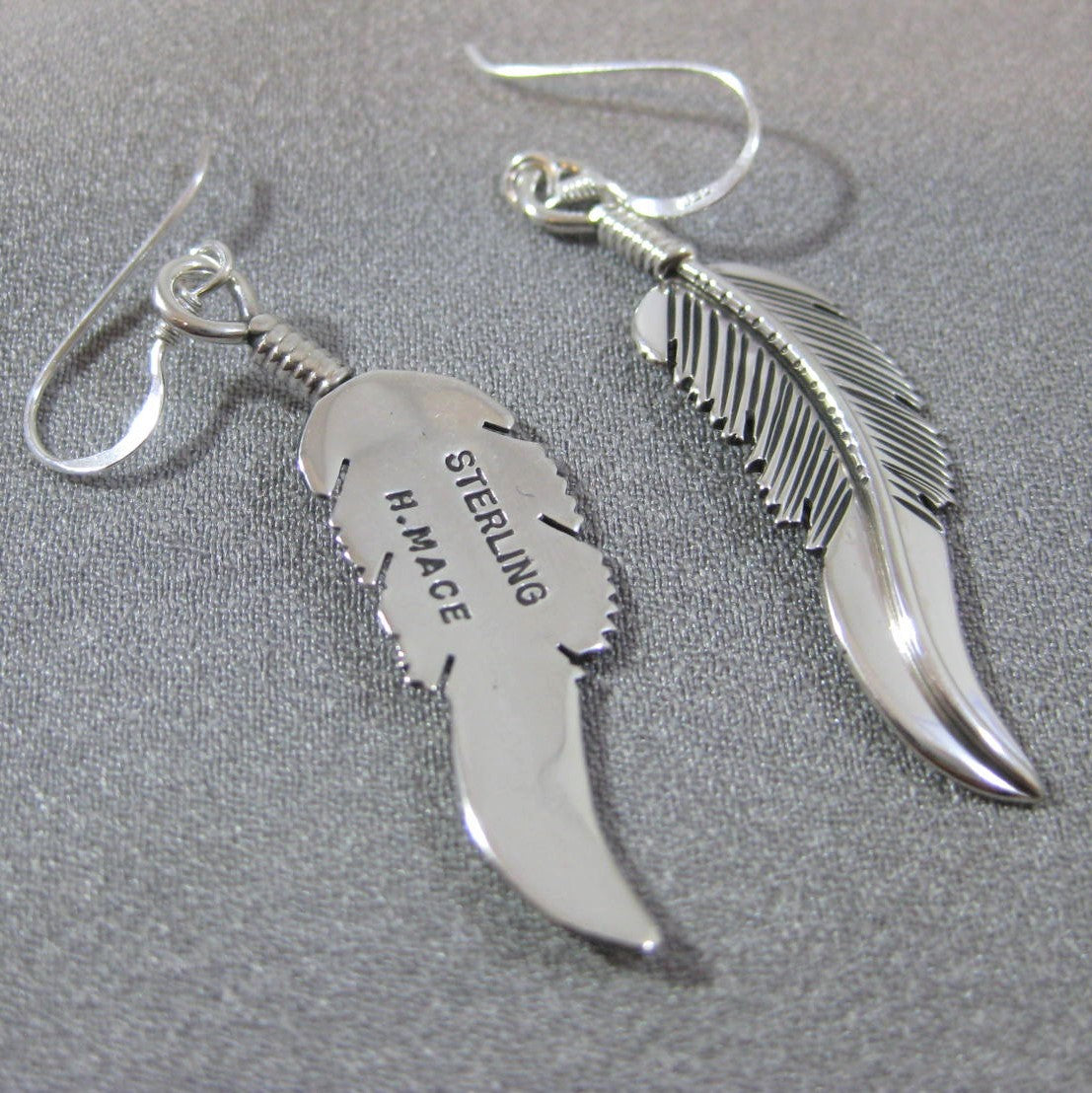 Feather earrings by Harvey Mace