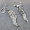 Feather earrings by Harvey Mace