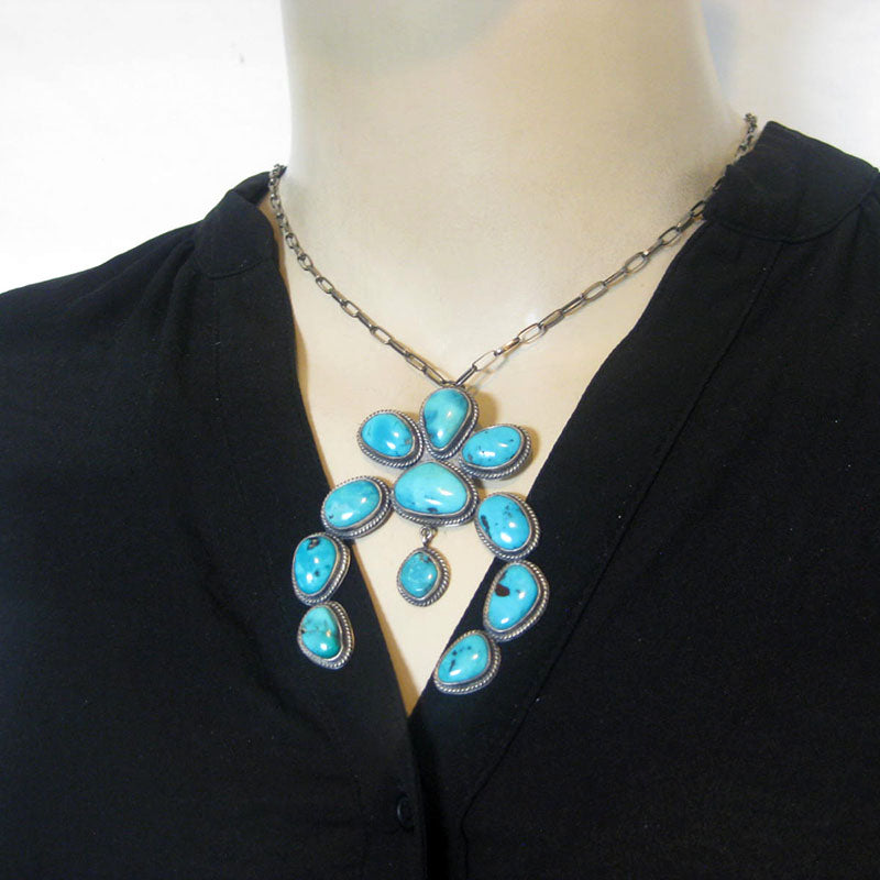 Red Mountain Naja Pendant by Robin Tsosie