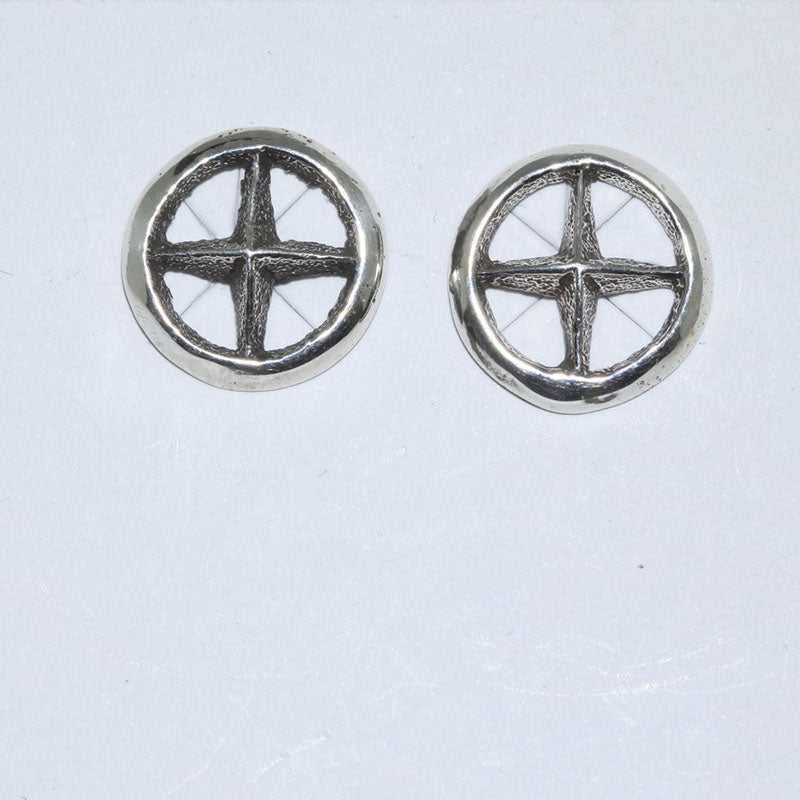 Tufa cast earrings by Aaron Anderson