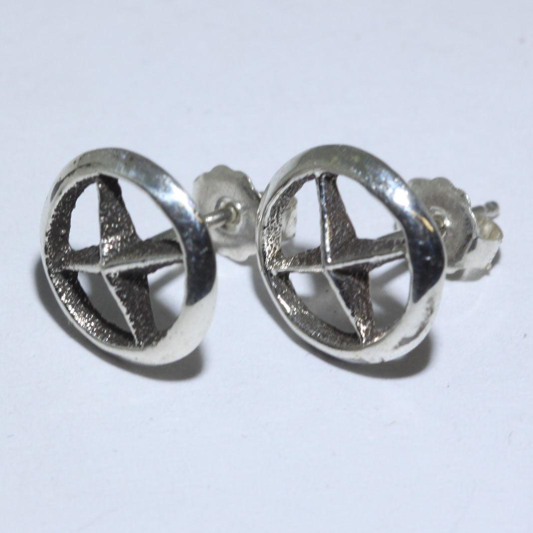 Tufa cast earrings by Aaron Anderson