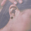 Tufa cast earrings by Aaron Anderson