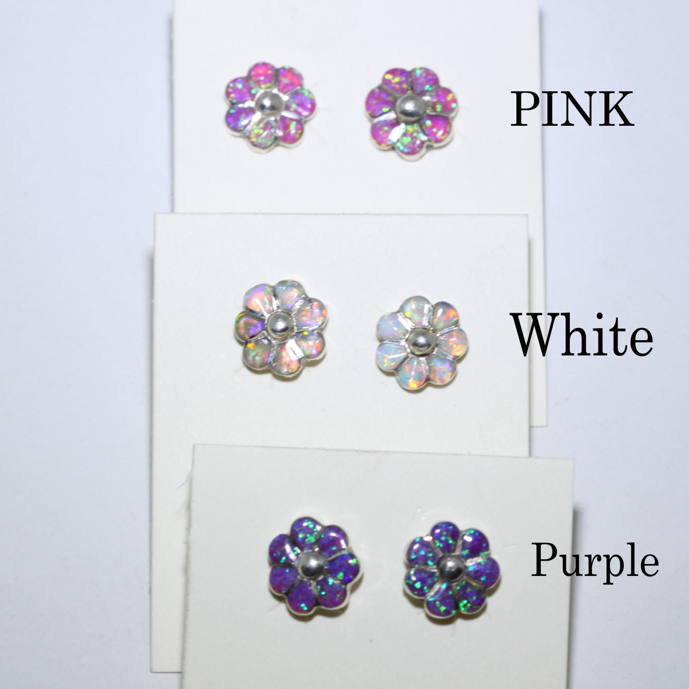 Flower inlay earring by Zuni