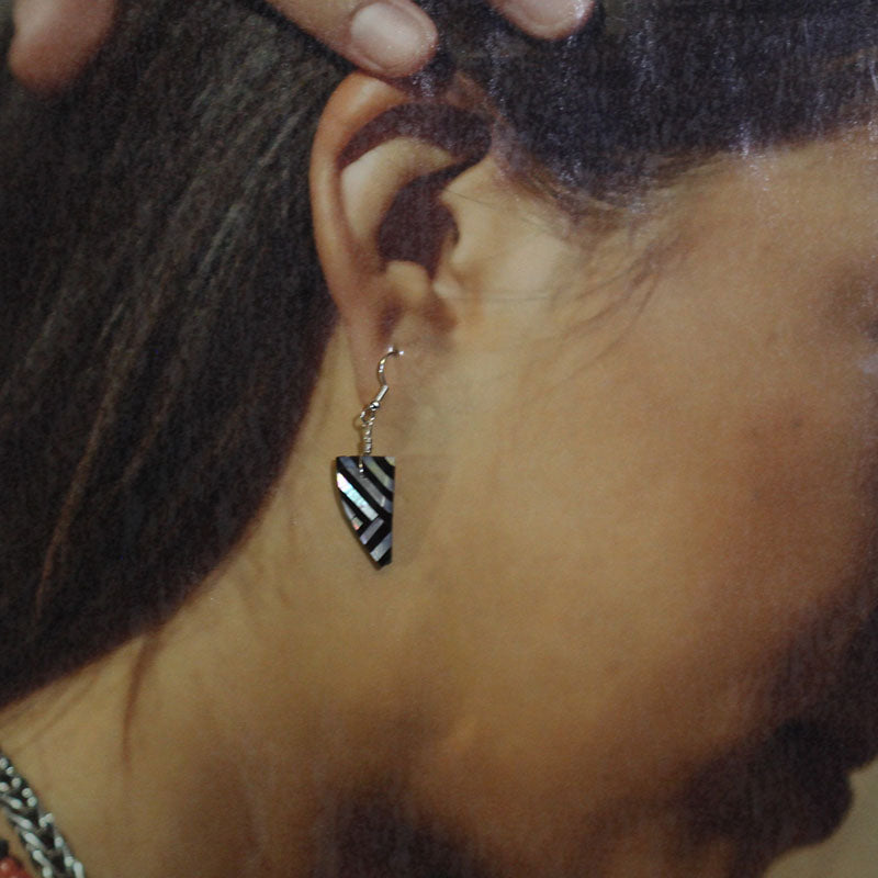 Earrings by Joe & Angie Reano