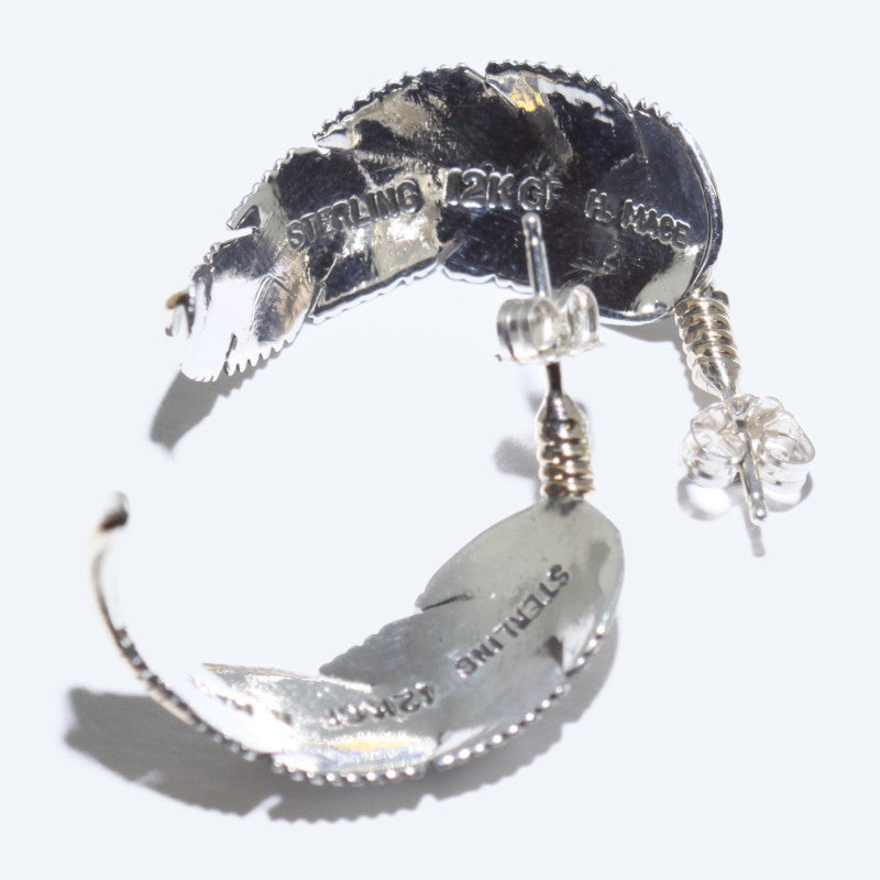 Two tone feather earring by Harvey Mace