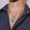 Egyptian Pendant by Robin Tsosie