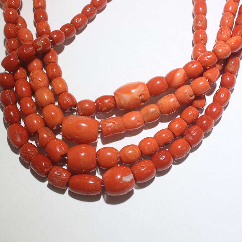 Red Coral beads necklace by Orville Jsinnie