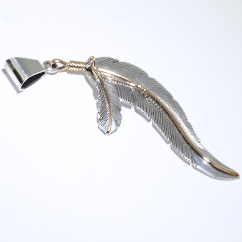 Feather pendant by Harvey Mace (silver or gold)