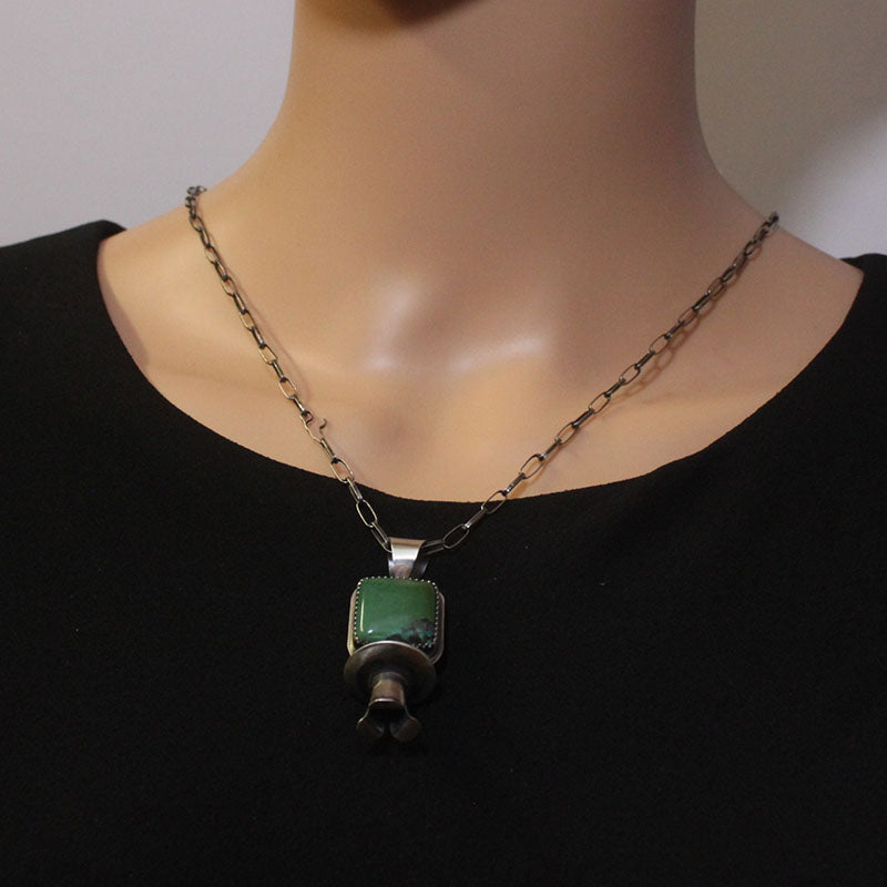 Chinese turquoise pendant by Navajo