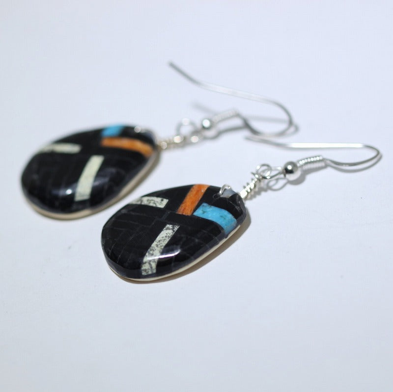 Earrings by Joe & Angie Reano