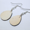 Earrings by Joe & Angie Reano