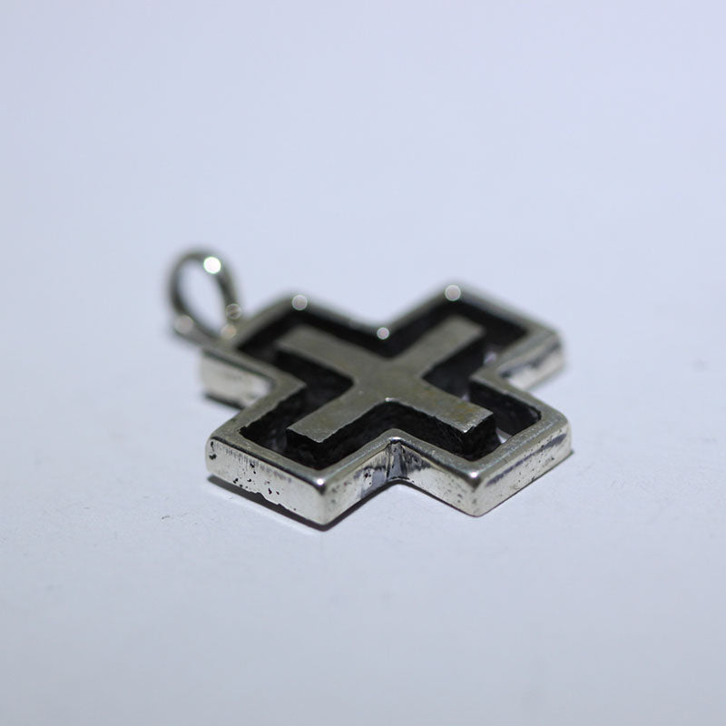 Cross pendant by Aaron Anderson