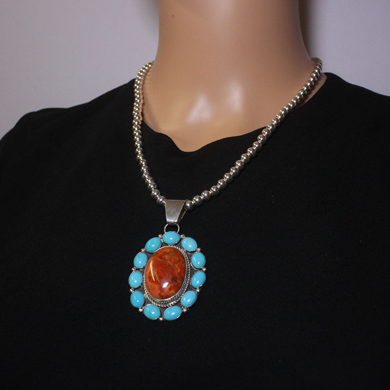 Sterling silver cluster pendant by Fred Peters