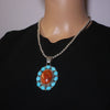 Sterling silver cluster pendant by Fred Peters