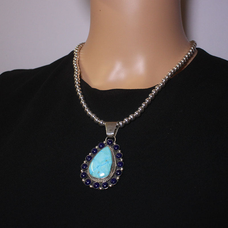 Sterling silver cluster pendant by Fred Peters