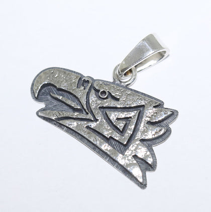 Silver Pendant by Ruben Saufkie