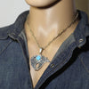 Blue Gem Pendant by Ruben Saufkie
