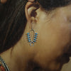 Squash blossom earring by Zuni