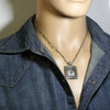 14K & Silver Pendant by Harrison Jim