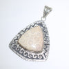 Fossilized coral Pendant by Ruben Saufkie