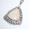Fossilized coral Pendant by Ruben Saufkie