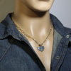 Silver Pendant by Ruben Saufkie