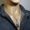 Silver Pendant by Ruben Saufkie