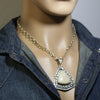 Fossilized coral Pendant by Ruben Saufkie