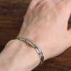 Feather bracelet by Harvey Mace (0.25")