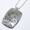 Silver Pendant by Norbert Peshlakai