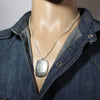 Silver Pendant by Norbert Peshlakai
