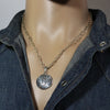 Silver Pendant by Ruben Saufkie